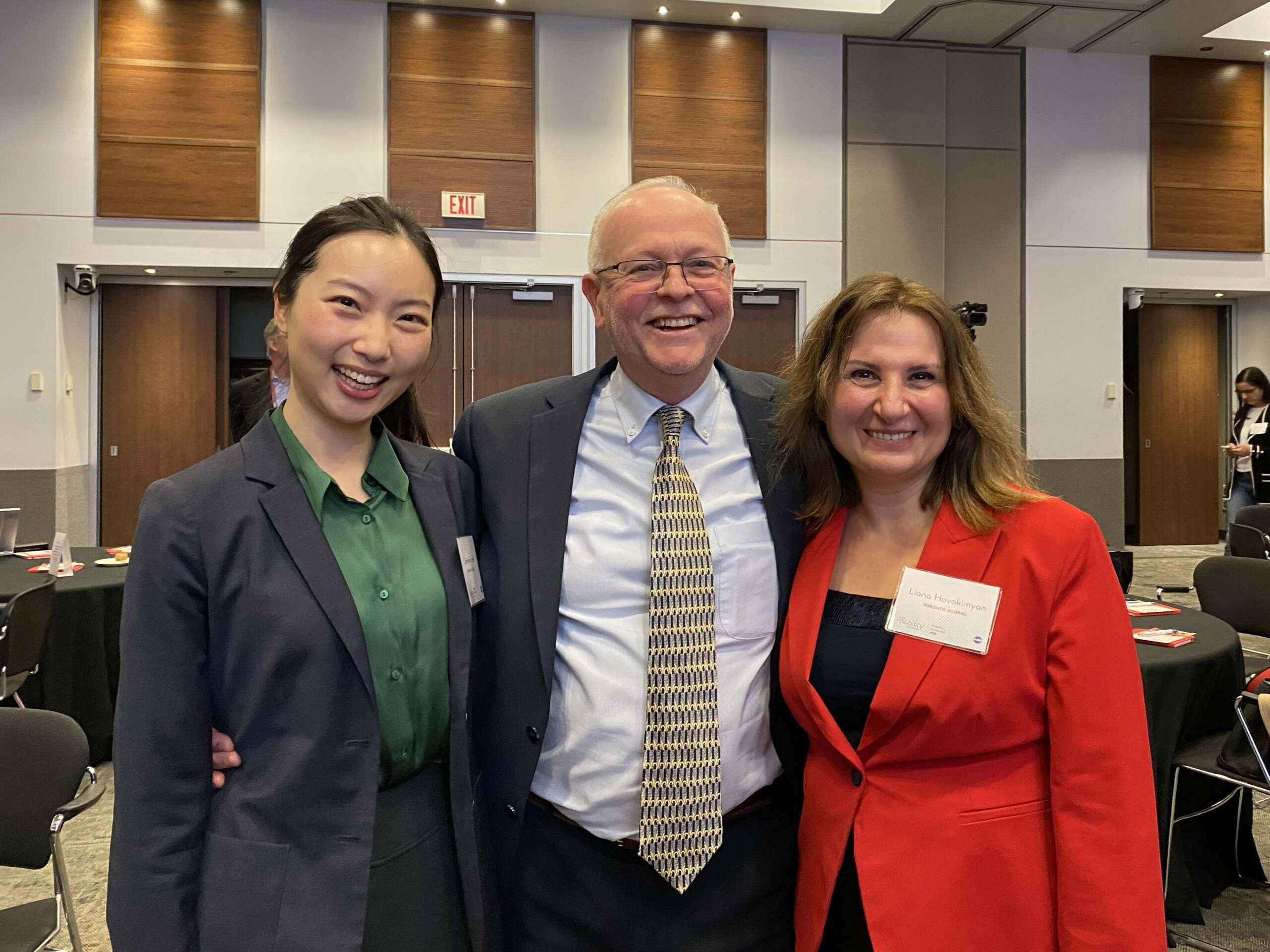 ProsFit CEO Alan Hutchison smiling with Toronto Global's Liana Hovakimyan and Catherine Lee.